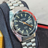 Close-up of Caravelle Set-O-Matic dual day/date display at 3 o’clock