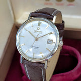 Close-up of silver dial Omega De Ville with date window