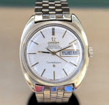 Close-up of vintage Omega Constellation silver linen-textured dial