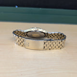 Omega stainless steel tonneau case with original gold-tone bracelet