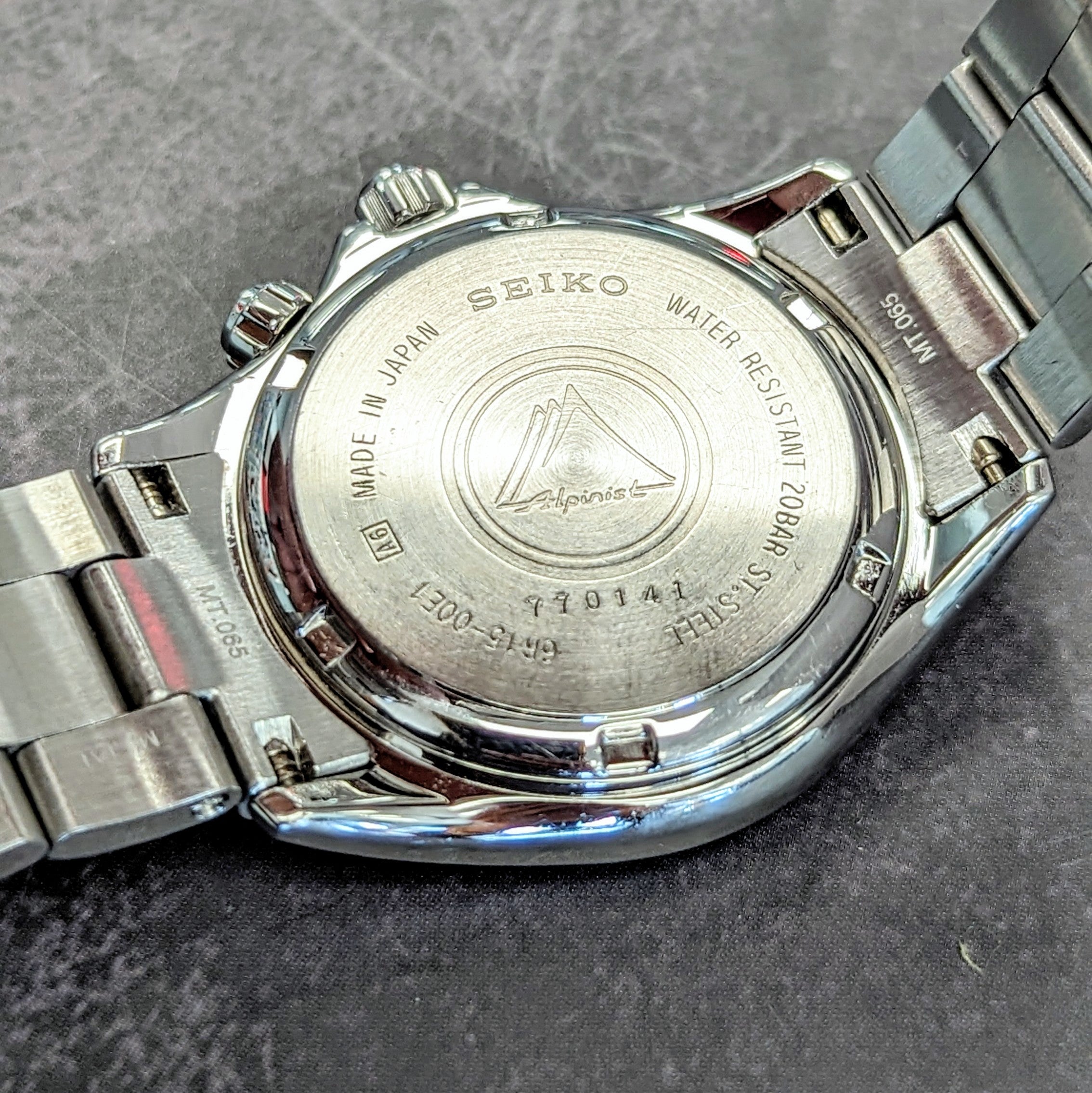 Seiko Alpinist 38mm stainless steel case back and engraved markings